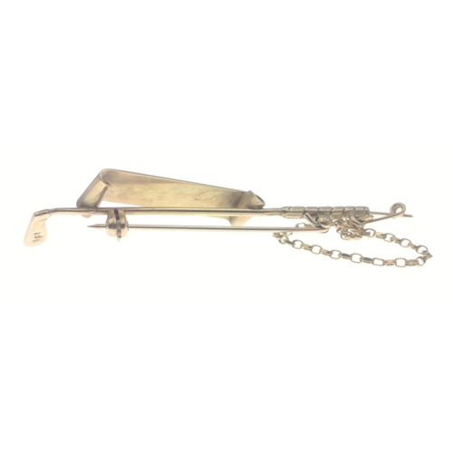 20 - A golfing gold bar brooch stamped 9ct with inscription 6cm long and safety chain, weight 4.25g appro... 