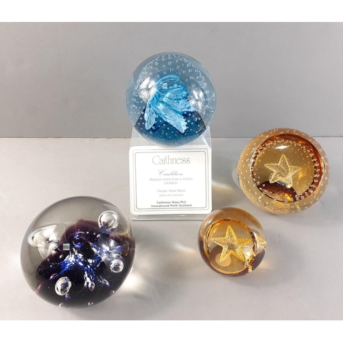 237 - Four CAITHNESS glass paperweights. Cauldron with display stand, Moonflower, Gold Star & Wee Star... 