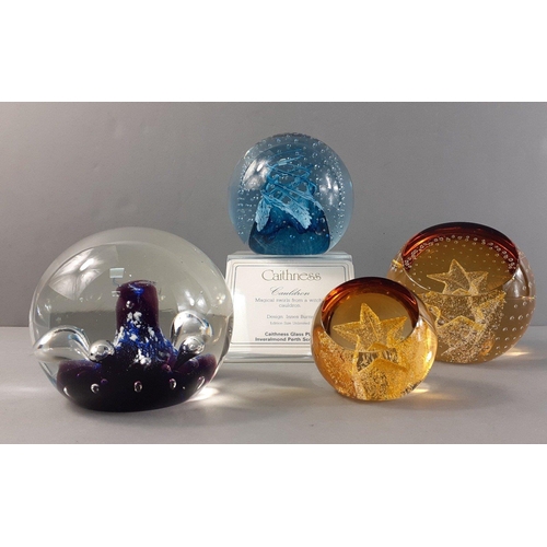 237 - Four CAITHNESS glass paperweights. Cauldron with display stand, Moonflower, Gold Star & Wee Star... 