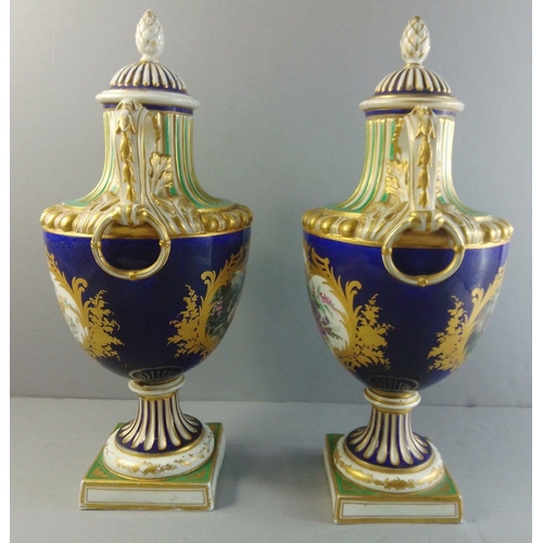 288 - A pair of SEVRES 19th century lidded urns with courting scenes. Each standing 38cm to finial. Histor... 