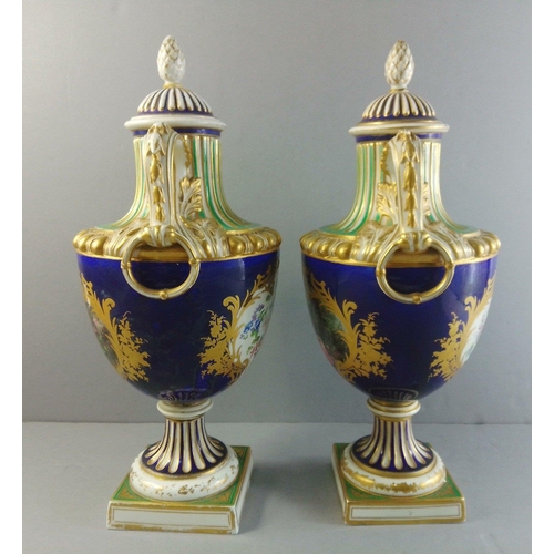 288 - A pair of SEVRES 19th century lidded urns with courting scenes. Each standing 38cm to finial. Histor... 