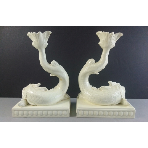 289 - A pair of WEDGWOOD white porcelain Dolphin Candlesticks. W17 x H24cm approx. A wonderfully sculpted ... 