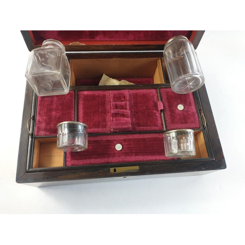 333 - A wooden travel box with 4 various glass pots. Interior lid detached.  30 x 22 x 12cm approx#337