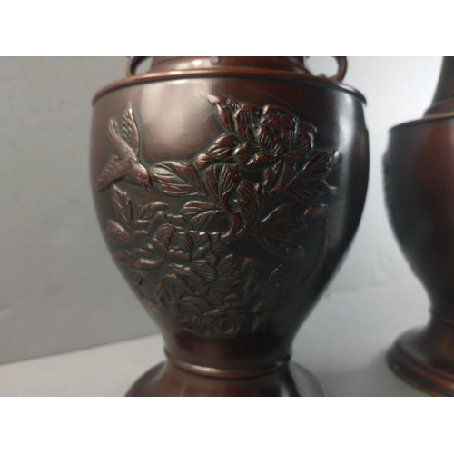 343 - A pair of bronze Oriental vases with dragon handles, each 31cm tall approx.#347