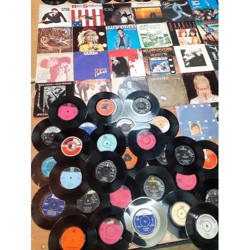 363 - A selection of 45 RPM single vinyl records. Most in sleeves, mainly 1980s.  Blondie, Feargal Sharkey... 