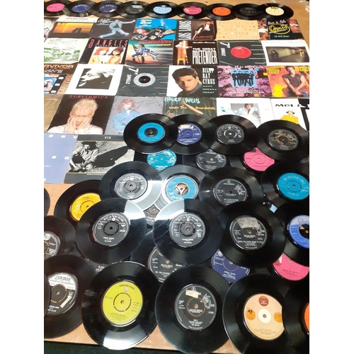 363 - A selection of 45 RPM single vinyl records. Most in sleeves, mainly 1980s.  Blondie, Feargal Sharkey... 