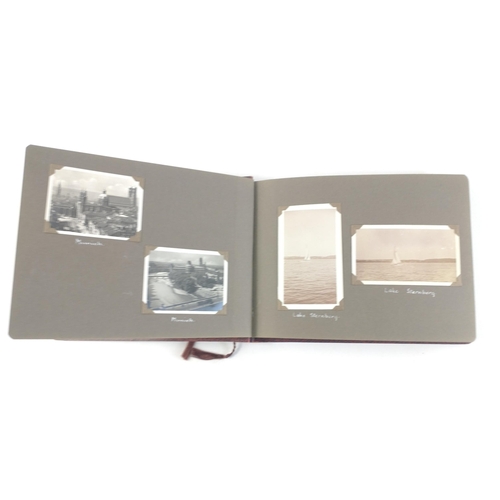 396 - An interesting photograph album with vintage Swiss photos.  Very well presented with 1930 Oberammerg... 