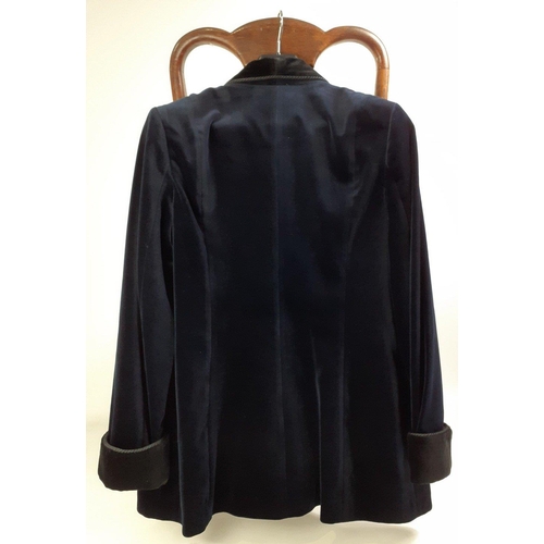 425 - A smart black velvet jacket by FAVOURBROOK with piping detail to the edges and turned-back cuffs, sm... 