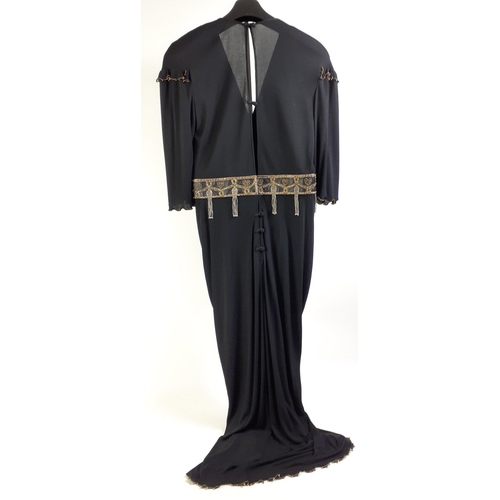 426 - FILM STAR LOOKS ! A black full-length vintage ZANDRA RHODES dress with side split and beaded detail.... 