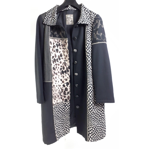 434 - A ¾ length black jacket with a leopard print border, with BETTY BARCLAY label, size UK 14 and a fabr... 