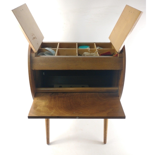 437 - A vintage 1950s wooden sewing box with some contents, opens both sides.  Stands 64cm high approx#441... 