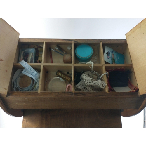 437 - A vintage 1950s wooden sewing box with some contents, opens both sides.  Stands 64cm high approx#441... 