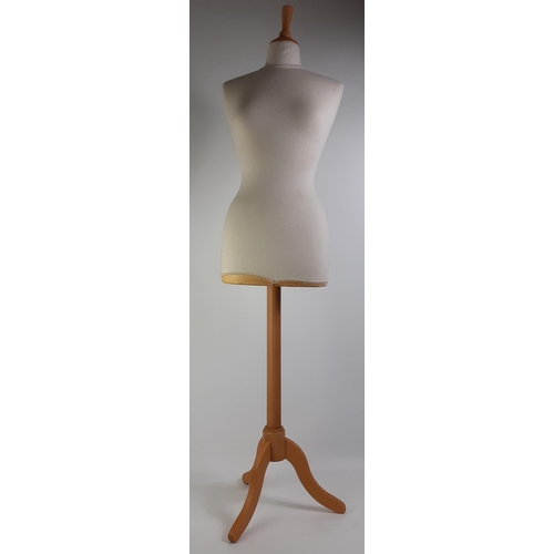 444 - A dressmaker's dummy on stand. 36