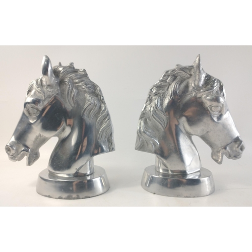 484 - A wonderful pair of well sculpted chrome plated decorative art Horses' Heads.  Each standing 23cm ta... 