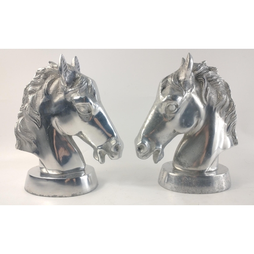 484 - A wonderful pair of well sculpted chrome plated decorative art Horses' Heads.  Each standing 23cm ta... 