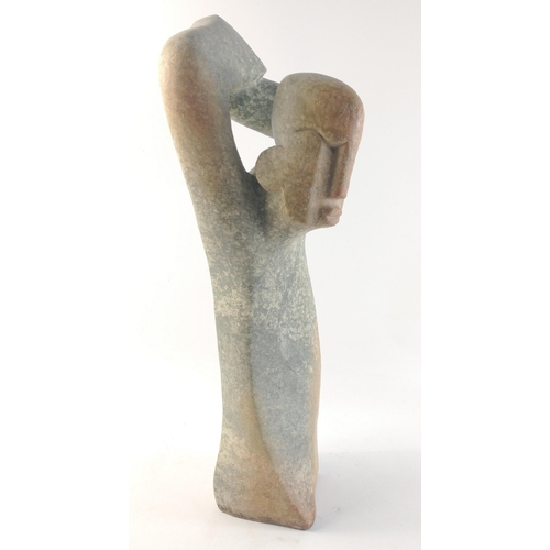 496 - A stone geometric sculpture figural piece of a man, 45cm high#500