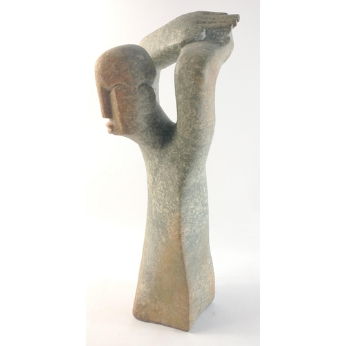 496 - A stone geometric sculpture figural piece of a man, 45cm high#500