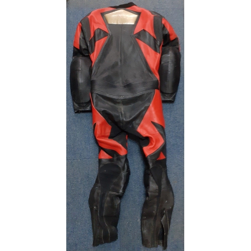 545 - A vintage all-in-one FRANK THOMAS leather motor cycling suit. Size UK42 with Kevlar padding.  Red/bl... 