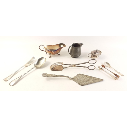 72 - A nice collection of silver plated items. To include sauce boat, spoons, cake slice, cake tongs, sug... 