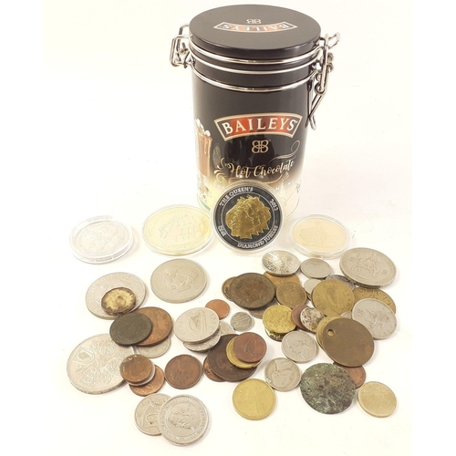 92 - A tin containing coins of interest including some modern crowns and plated coins and a selection of ... 