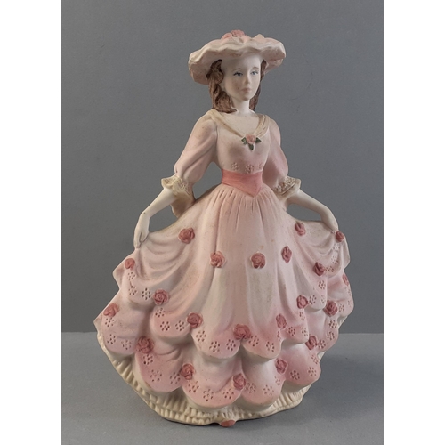 256 - A COALPORT Beau Monde Elizabeth figurine with matte finish.  Stands 14cm high approx.  Boxed with no... 