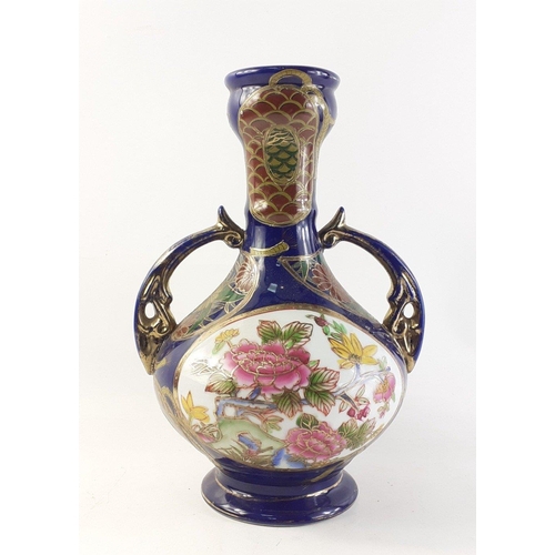 272 - A stylish twin handled floral urn shaped vase in the style of vintage Sevres. Attractive cobalt blue... 