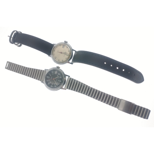 34 - Two TIMEX gentleman's watches one black dial, one silver.  Both working#4