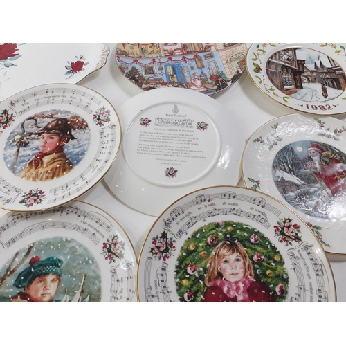 565 - A collection of six ROYAL DOULTON Christmas plates, five ROYAL WORCESTER Christmas plates, one WEDGW... 