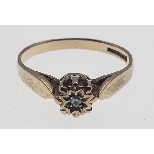 13 - A 9ct fully hallmarked gold diamond ring size M with small central illusion cut diamond, gross weigh... 