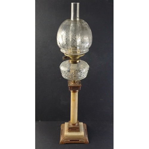 203 - Impressive cream oynx column oil lamp with Art Deco style cast base, chimney, glass reservoir and et... 