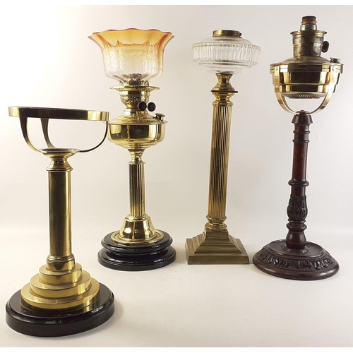 206 - Collection of 4 oil lamp bases to include 3 brass, 1 wooden. Tallest: 55cm approx#215