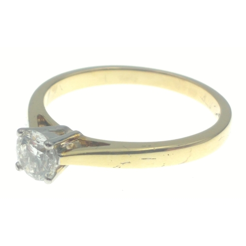 35C - A lovely 750 stamped 18ct gold ring with lovely centre diamond (tested) 5mm approx (0.5 carat approx... 