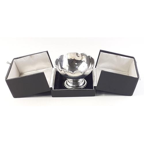 43 - A sterling silver stamped footed bowl in lovely condition and stored within a presentation box. 8cm ... 