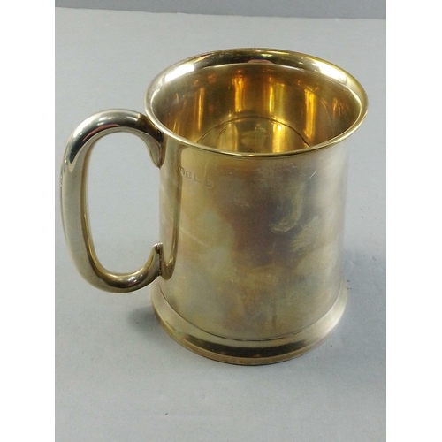 53 - A silver hallmarked tankard, Birmingham 1930, maker's mark unclear.  11cm high approx. Weight 265g a... 