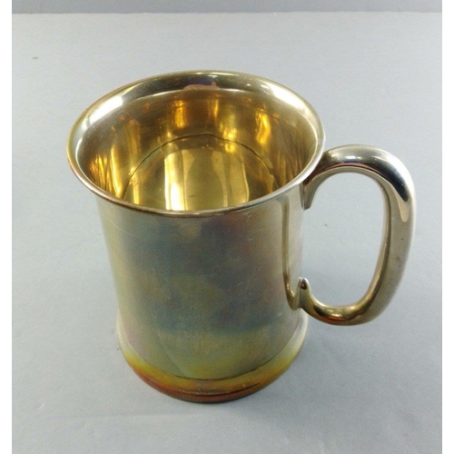 53 - A silver hallmarked tankard, Birmingham 1930, maker's mark unclear.  11cm high approx. Weight 265g a... 