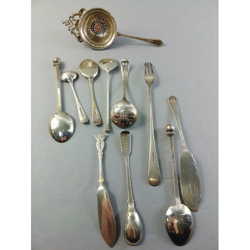 59 - A small silver collection to include  pickle forks, tea strainer, spoons etc.  A super little lot.  ... 