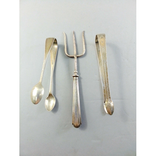 60 - A silver pickle fork and 2 pairs of sugar nips.  Weight 102g approx#65