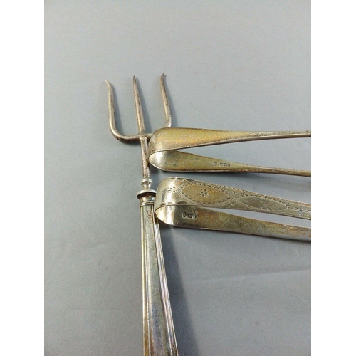 60 - A silver pickle fork and 2 pairs of sugar nips.  Weight 102g approx#65