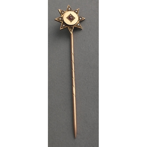 7 - A 9ct gold stick pin with ruby and seed pearls. Gross weight 1.5g approx#8