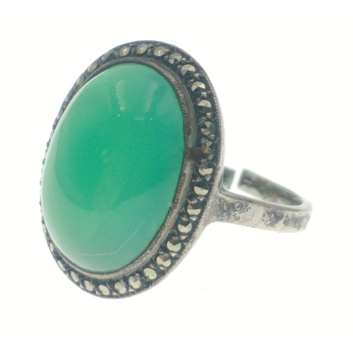 122B - An 835 stamped silver ring with substantial green centre stone with marcasite surround. Size M, gros... 