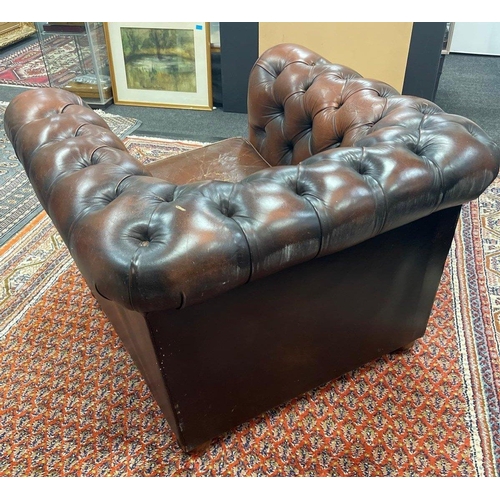 157 - A deep buttoned CHESTERFIELD brown leather chair - a nice patina! - stands 70cm tall x 100cm width x... 