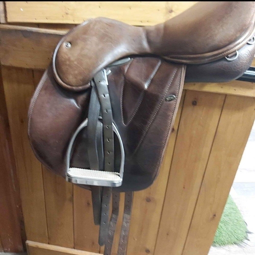 377 - Brown WOW branded leather saddle fully adjustable, with stirrup leathers & irons  - this belonge... 