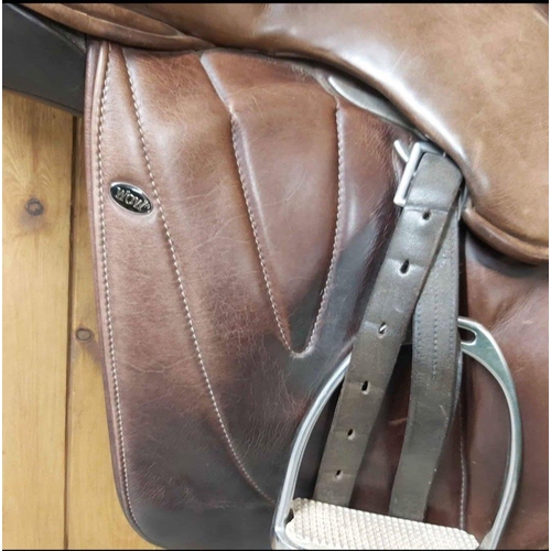 377 - Brown WOW branded leather saddle fully adjustable, with stirrup leathers & irons  - this belonge... 