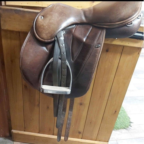 377 - Brown WOW branded leather saddle fully adjustable, with stirrup leathers & irons  - this belonge... 