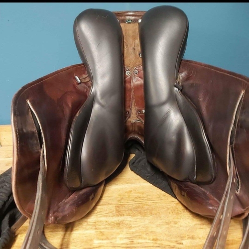 377 - Brown WOW branded leather saddle fully adjustable, with stirrup leathers & irons  - this belonge... 