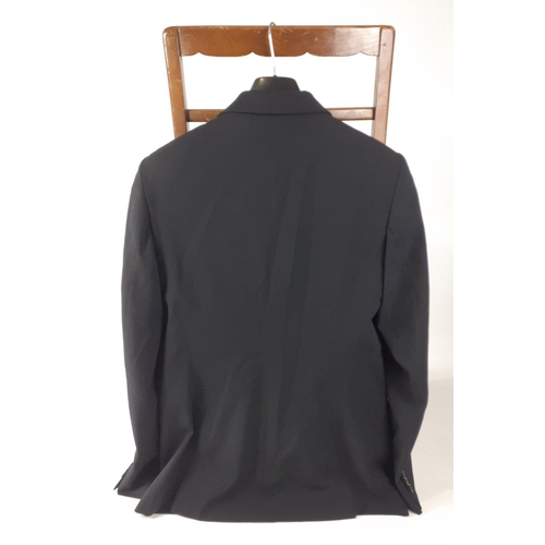 390 - A GUCCI ladies black jacket with 2 pockets and 2 buttons, size 44#142