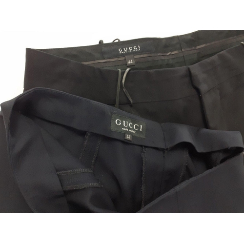 391 - One pair of GUCCI ladies trousers size 44, 97% wool with leather belt tabs, and 1 pair GUCCI pure wo... 