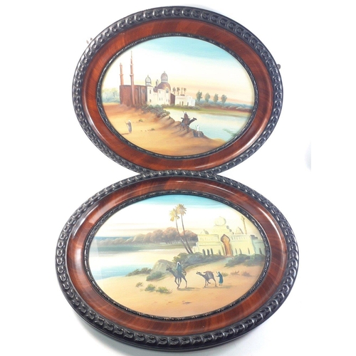 410 - A pair of Middle Eastern paintings showing desert scenes with men and camels in attractive VICTORIAN... 