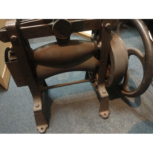 486 - An ANTIQUE heavy cast cobblers mangle with embossed plate 51cm approx. Note the top wheel is snapped... 