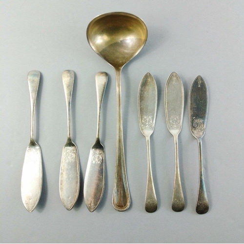 82 - Small silver plated lot comprising ladle and six butter knives as well as an aluminium coffee jar an... 